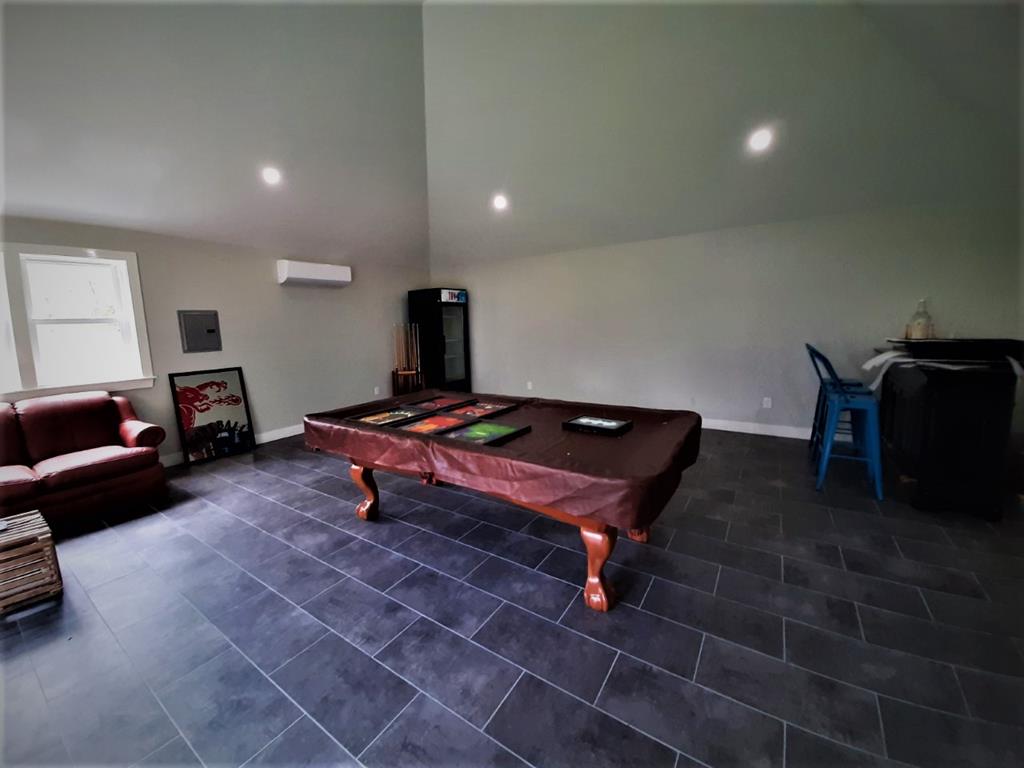Pool table in Game House with cooler