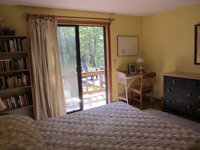 Master Bedroom With Cheery Yellow Walls