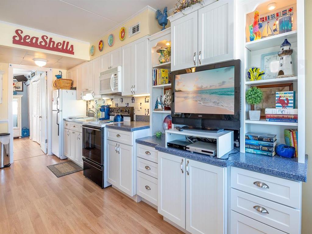 Beautiful condo at the beach with a pool! | Photo 12