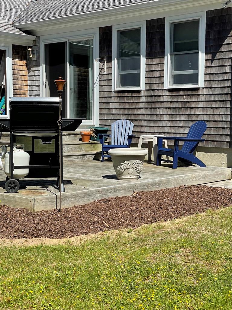 Back Deck Gas Grill and Seating Area
