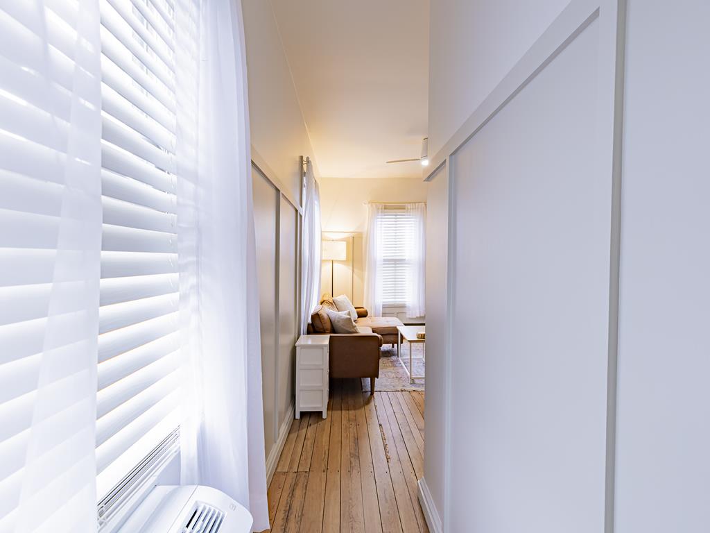 Living Room Hallway with Window Air Conditioner