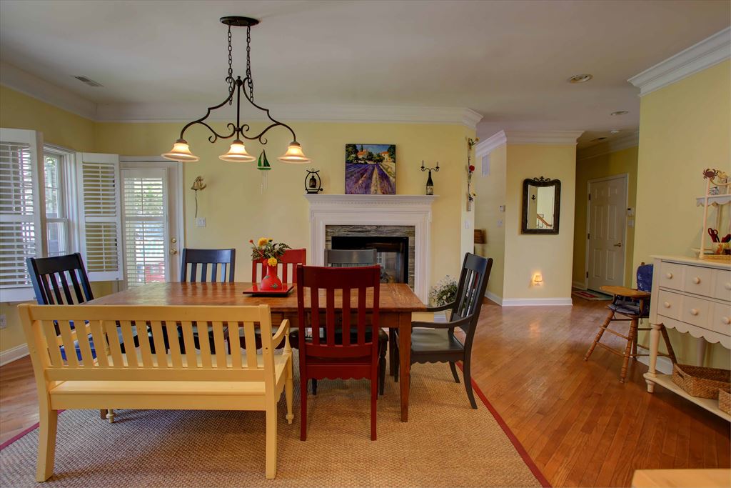 Kitchen dining area with view of fireplace