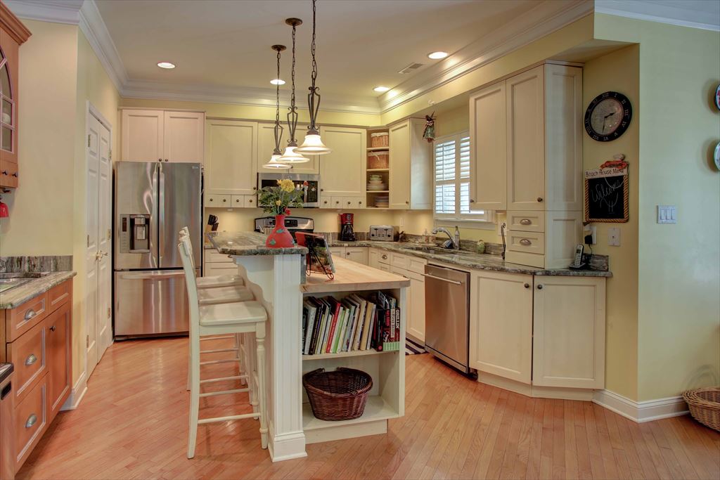 Kitchen with view of island seating
