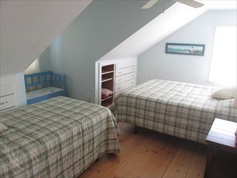 2nd floor bedroom with 1 twin and 1 queen